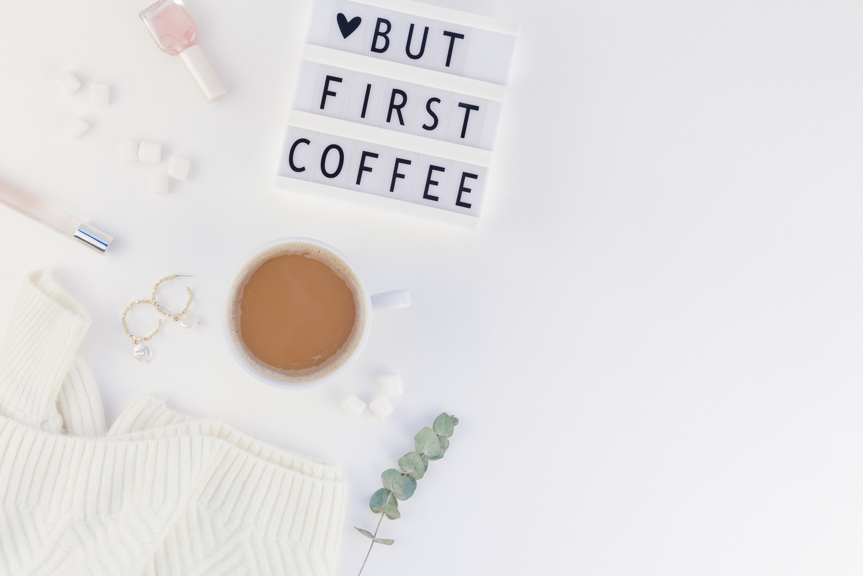 But first coffee text on lightbox with Coffee Cup