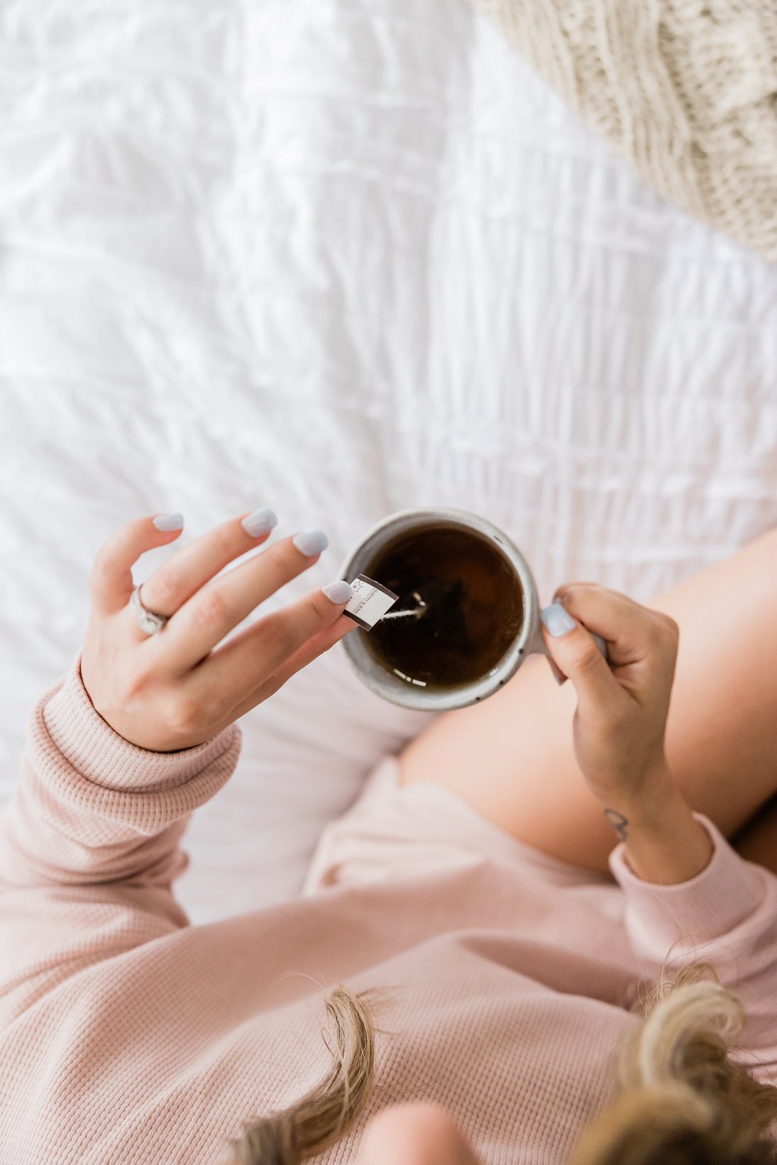 Woman Drinking Tea In Bed